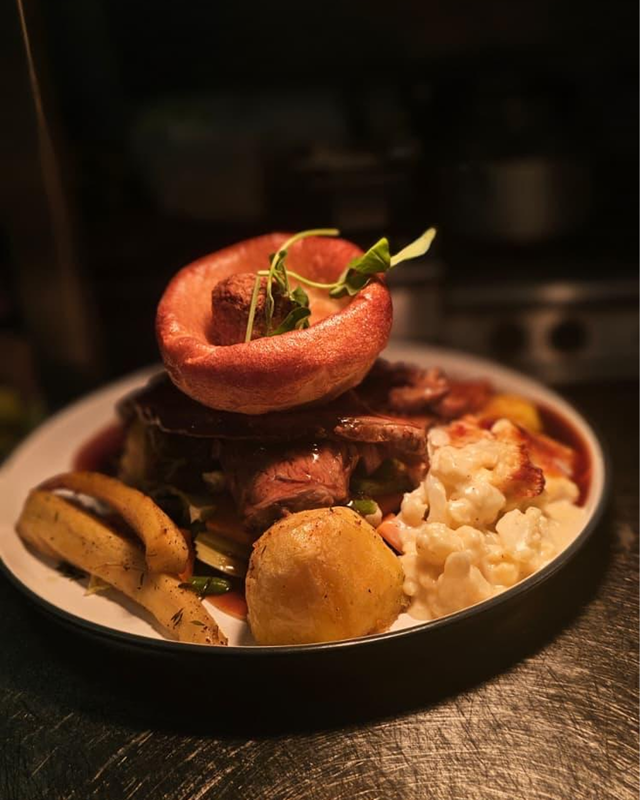 Roast beef with Yorkshire pudding, roast potato and cauliflower cheese at The Victoria Inn